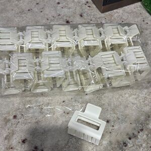 1 set of 20 white hair clips. Brand new , never worn
